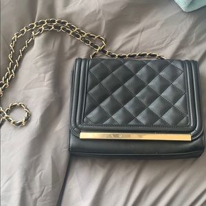 black and gold purse